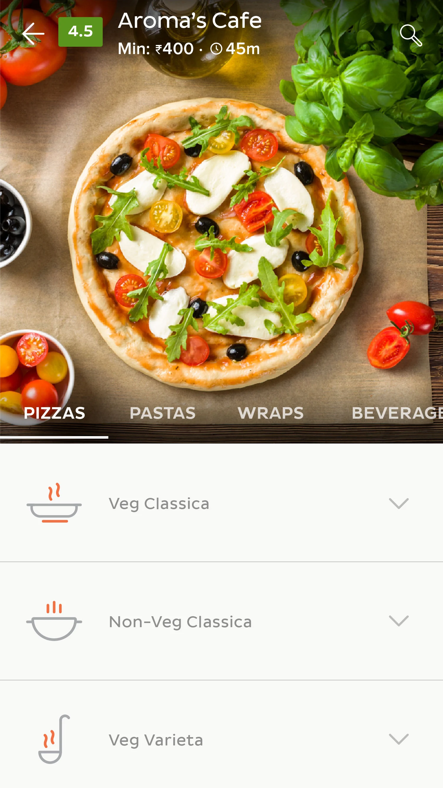 A cafe menu with a pizza hero image and categories for pizzas, pastas, wraps and beverages